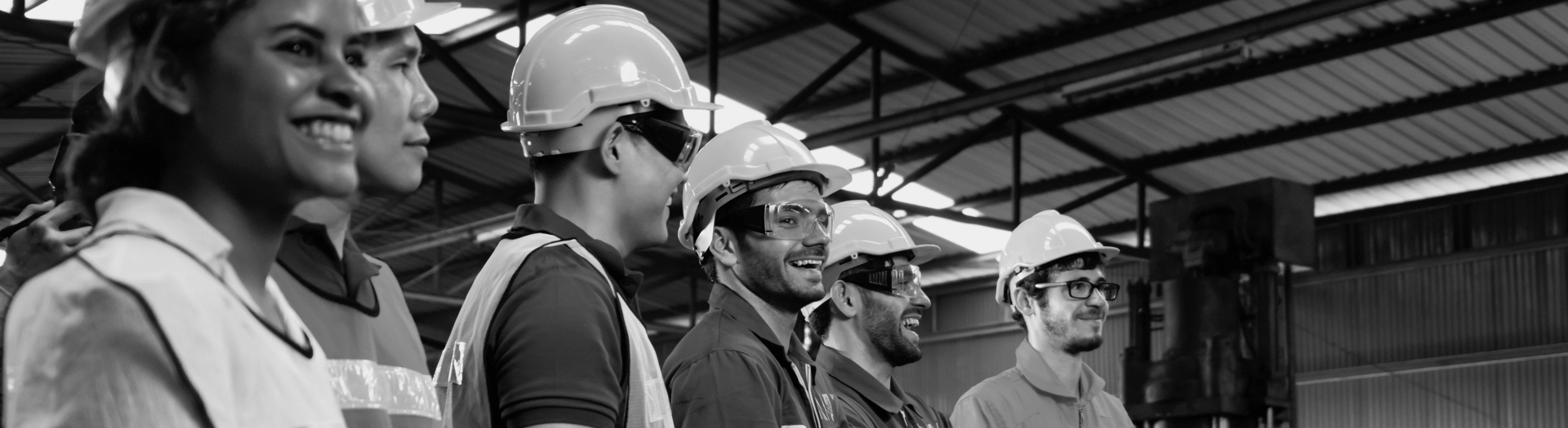 Header 1 Image of people wearing head and eye protection