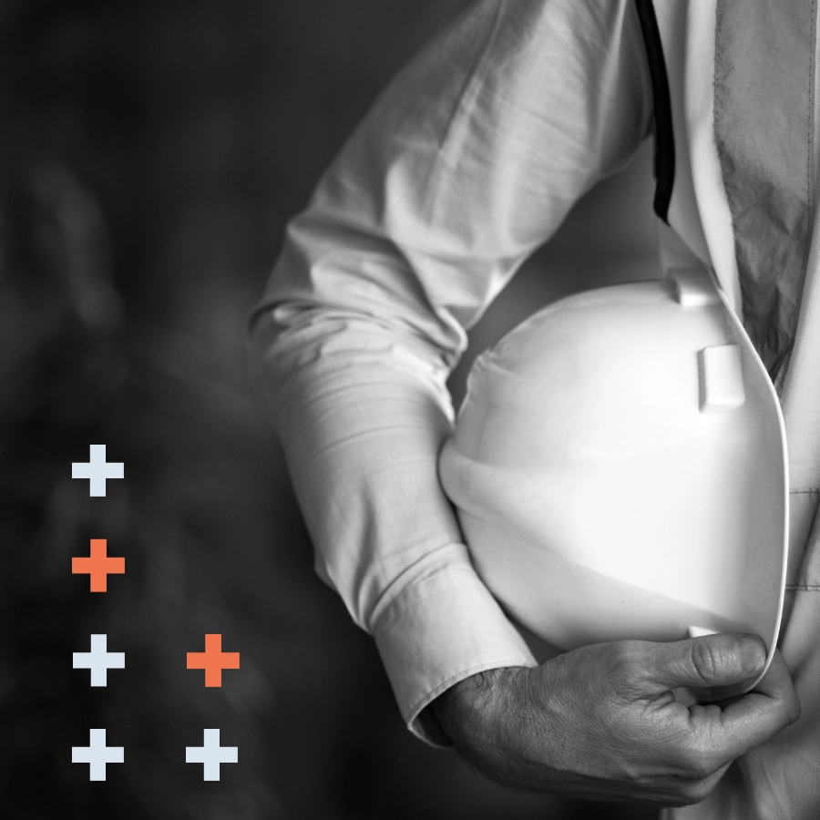 Image of a man holding a protective helmet